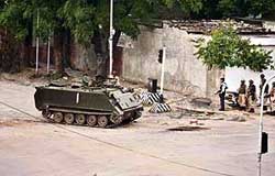 A Pakistan army armoured personnel carrier takes up position outside Lal Masjid in Islamabad on Tuesday.
