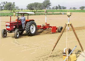 A demonstration of the laser-guided land-leveller implement