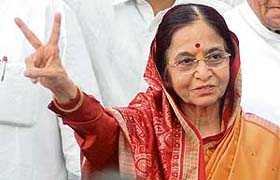 President-elect Pratibha Patil makes a V-sign at her residence in New Delhi