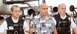 Maninder Pal Singh Kohli is arrested at London's Heathrow Airport after being extradited from India.