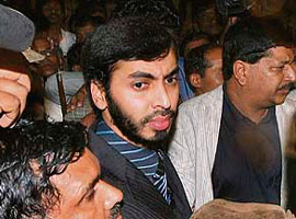 Dr Mohammed Haneef arrives at Bangalore airport on Sunday night.