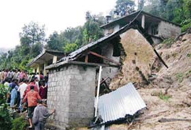 The remains of a house that collapsed at Gadhari village in Gohar subdivision of Mandi
