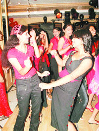Air-hostess trainees shake a leg at a freshers party in Jalandhar.