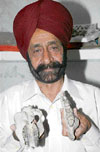 V.S.Soni displays the fossilised upper jaw of a hippopotamus found from the Shivalik ranges.
