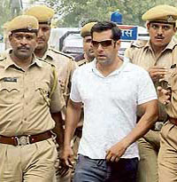 The police brings actor Salman Khan to the court in Jodhpur on Saturday. He was arrested on his arrival at the airport.