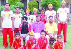 Proud Moment: Students of JDS Public School exhibit their medals which they won in an All-India Invitational Table Poker Championship