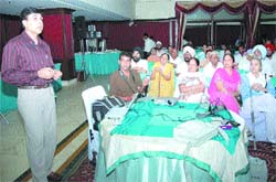 An expert delivers a talk during a doctor-patient interface in Amritsar on Friday.