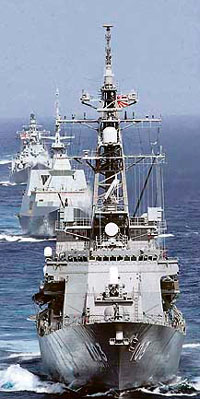 Japan Maritime Self-Defense Force destroyer JS Yuudachi (DD 103) leads a formation of ships during Exercise Malabar 2007 in the Bay of Bengal. More than 20,000 naval personnel from the navies of India, Australia, Japan, the Republic of Singapore, and the United States are taking part in the exercise, designed to increase inter-operability among the navies and to develop common procedures for maritime security operations.