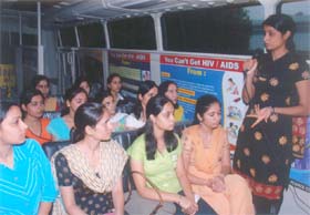 A Red Ribbon Club representative briefs Apeejay College students