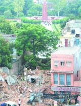 The shops adjoining Jallianwala Bagh are being razed so that a VIP parking can come up.