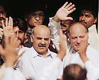 Shahbaz Sharif (left) with brother Nawaz.