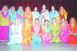 The winners of a talent search contest pose for photograph along with their principal at S.R. Government College for Women