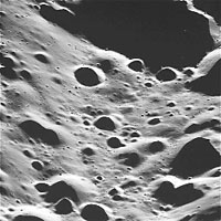 This image taken from the camera mounted on the Cassini spacecraft and released by NASA on Wednesday shows the surface of Saturn's moon lapetus.