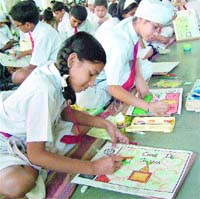 Students deliver their best during a painting contest organised by JCI at Desh Bhagat Yaadgar Hall in Jalandhar.