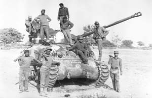 Indian troops atop a captured Pakistani tank in the Shakargarh sector in 1971