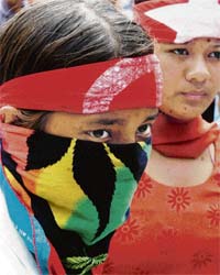 Nepalese Maoist supporters at a mass meeting at an open air theatre in Kathmandu