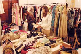 A woman having a look at the creations on display