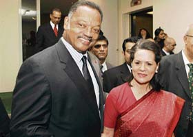 Sonia Gandhi, chairperson of the UPA, greets Rev Jesse Jackson (left) on the sidelines of the United Nations General Assembly at the UN Headquarter in New York