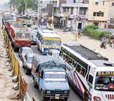 Traffic moves at a snail’s pace on National Highway-1 in Panipat.