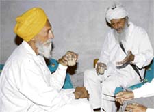 Freedom fighter Bijender Singh (right) at his native village in JInd district