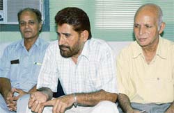 Surat Singh (centre), director of the HIRD, along with Prof Ranbir Singh (right) and Prof S. Kaushal.