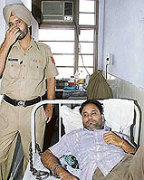 Bikramjit Singh, a convict, enjoys comforts of home in government hospital, Amritsar, on Thursday.