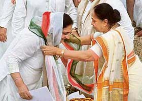 Rajinder Kaur Bhattal being garlanded by Margaret Alva at a function in Chandigarh
