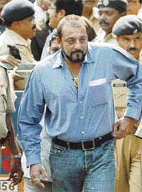 Bollywood star Sanjay Dutt arrives at a special court in Mumbai