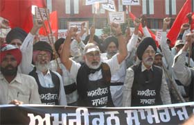 CPM activists take out a protest march in Jalandhar