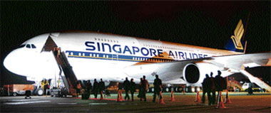 The Singapore Airlines A380 is seen on the tarmac at Sydney International Airport, on Thursday after its maiden commercial flight from Singapore.