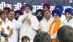 Punjab Chief Minister Parkash Singh Badal addresses devotees at a “shobha yatra” organised on the eve of the birth anniversary of Maharshi Valmiki in Jalandhar