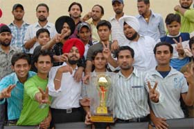 The winning team of the Apeejay College of Fine Arts with the trophy