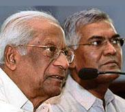 CPI general secretary A B Bardan and national secretary D Raja address a press conference at their party office in New Delhi on Thursday.