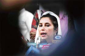 Benazir Bhutto while addressing a press conference in Islamabad