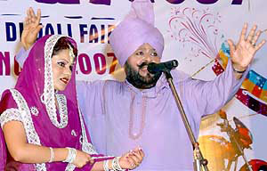 Folk singers Mohammad Sadique and Sukhjit perform during a Diwali mela in Jhanda ground in Rajpura on Friday.