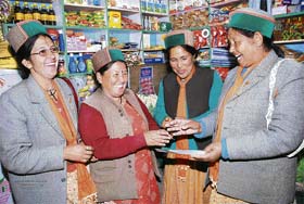 Volunteers of a political party woo two shopkeepers in Chitkul village, on the border with China, in Kinnaur, which goes to the polls with two other tribal districts — Bharmour and Lahaul-Spiti