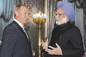 Russian President Vladimir Putin listens to Prime Minister Manmohan Singh during their meeting at the Kremlin in Moscow