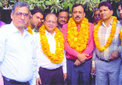 Amritsar MC mayor Shawet Malik (2nd from right) laid the foundation stone of a road widening work in Joshi Colony.