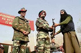 A militant lays down arms before Lt-Gen A S Sekhon, GOC, 15 Corps, at Awantipora, about 30 km from Srinagar