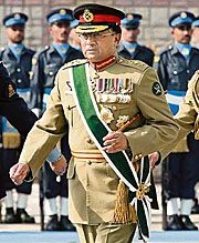 Generals last walk: Pervez Musharraf reviews the guard of honour in Islamabad, on Tuesday.