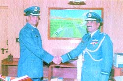 Group Captain PW Ambedkar (L) takes over the charge.