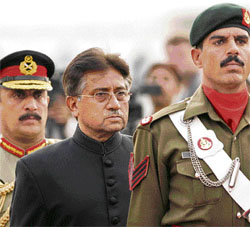 Pakistan's President Pervez Musharraf inspects the guard of honour after he was sworn in at the President House in Islamabad on Thursday.