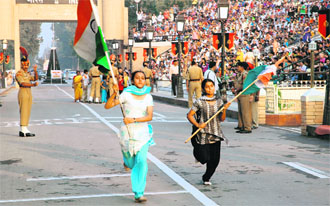 Enthusiasts from both sides race from the gallery to the iron gates