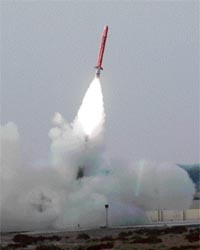 This military handout picture taken on Tuesday shows nuclear-capable Babar Hatf-7 missile being fired during a test at an undisclosed location in Pakistan.