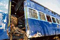 The damaged portion of the New Delhi-bound Rajdhani Express at Sungajan Railway Station, Golaghat, on Thursday.