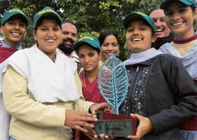 Students of Government Senior Secondary School, Boormajra, with the Greenest School of India trophy