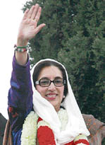 Benazir Bhutto waves to supporters shortly before she was killed