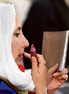 Former Prime Minister Benazir Bhutto gets ready for her last public rally in Rawalpindi
