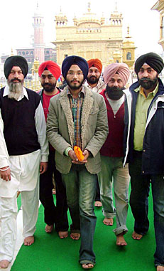 Ishmeet Singh, winner of Star Voice of India, pays obeisance at the Golden Temple.