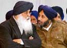 Chief Minister Parkash Singh Badal listens to Sukhbir Badal, SAD working president, at the Maghi Mela on Sunday in Muktsar.